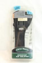 New in pkg Uncle Mike's Sidekick holster size 4, fits 7-8.5" revolvers
