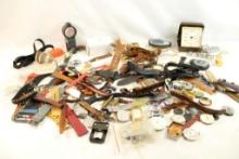 Large bag of watch bands, faces, key chains, clock and other misc items