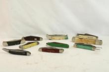 Ten folding pocket knives