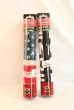 Two American flag bench matts, in packages.