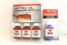 One Tru-oil gun stock finish kit, and one bottle of brass black. In packages.