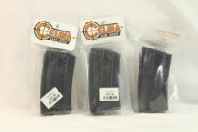 Three Ruger mini-14 magazines, in packages.