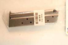 One Kimber 10mm magazine. In package.