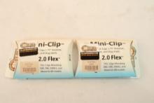 Two mini-clips for Mossberg 12 ga. Fits 500, 590, 590A1 models. In packages.