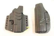 Two right handed holsters One belt, one belt clip inside.
