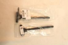 Two AR-15 charging handles.