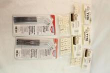 Two packs of Angled cleaning brushes, and five packs of 7.62 cleaning pads. In packages.