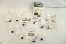 Bag of miscellaneous gun accessories. In packages.