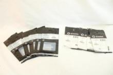 Three CMMG MK3 firing pin retainers, and nine Sig Sauer tapered firing pin blocks. In packages.