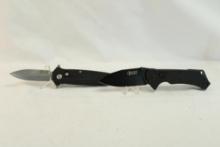Two Elite Tactical belt clip assisted opening knives. In boxes.