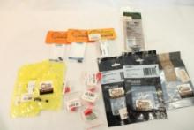 Bag containing 2 Sig Sauer O rings, one Weaver top mount base, 3 stock bushings, one M4 muzzle