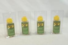 Four 1 oz bottles of Remington Rem Oil, new