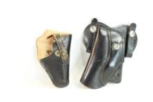 Two small leather RH holsters