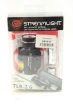 Streamlight rail mounted tactical LED flashlight with green laser, new in pkg