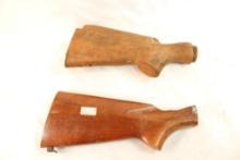 Two wood buttstocks, one for Mossberg and one for British Enfield #4
