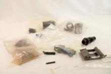 Bag with one threaded .45 barrel bushing adaptor, 4 quick release swivels, gun belt buckle, trigger