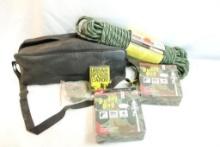Roll of 250 lb load limit camo rope, two Buddy Bag portable toilet systems, one nylon zipper bag and