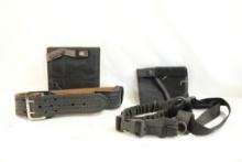 Black leather belt, two velcro Under Tech holsters and one single point gun sling