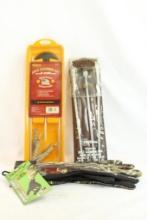 Two rifle cleaning rod sets and pair of Primos stretch camo one size fits all gloves