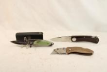 Bag containing 3 folding knives, one FT Tactical with 3" blade, new in box, one Khymber 4" blade and