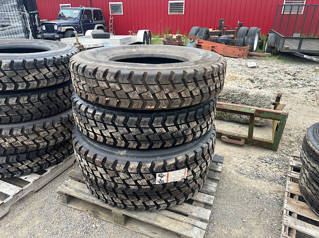 (4) 11R22.5 WASTE HAULER LUG RETREADS