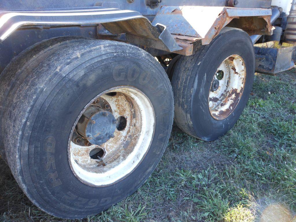 1996 Mack DM690S Tri-Axle Rolloff Truck