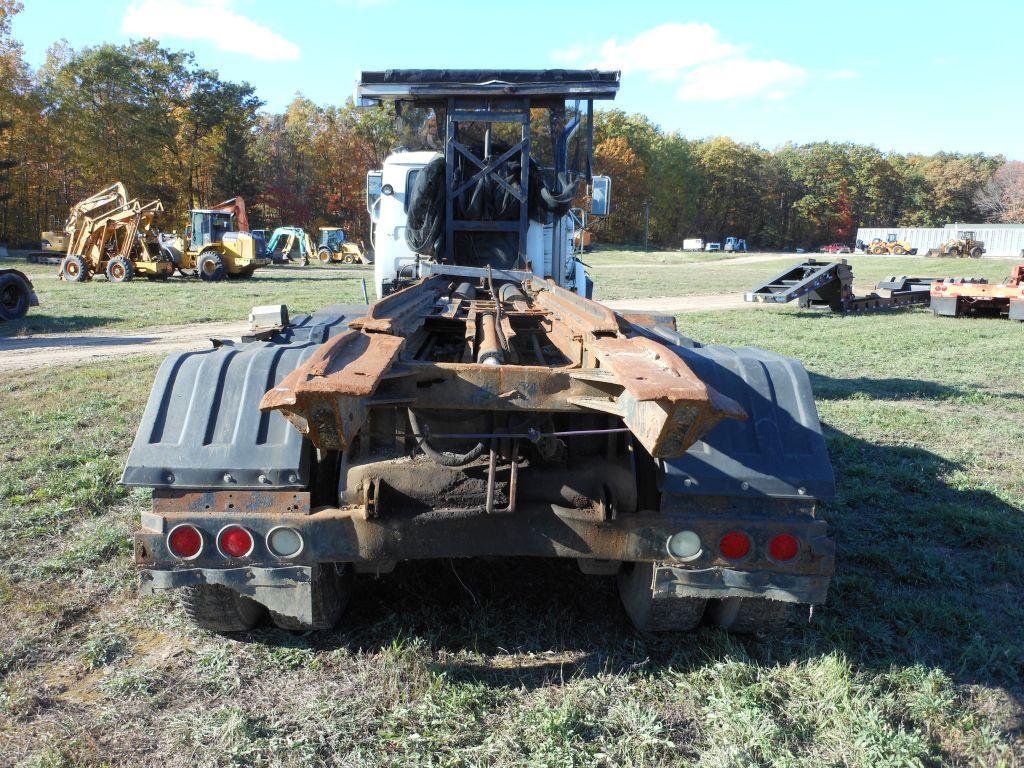 1996 Mack DM690S Tri-Axle Rolloff Truck