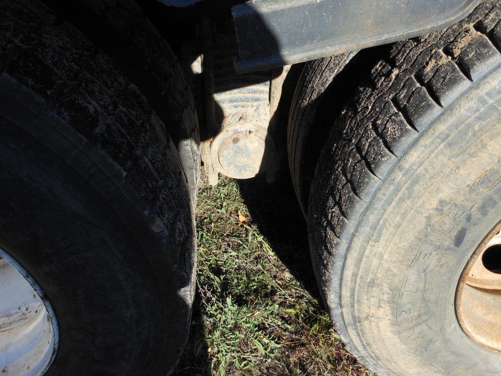 1996 Mack DM690S Tri-Axle Rolloff Truck