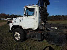 1996 Mack DM690S Tri-Axle Rolloff Truck