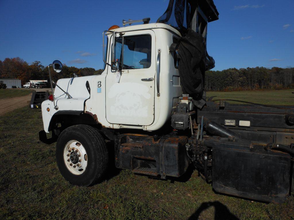 1996 Mack DM690S Tri-Axle Rolloff Truck