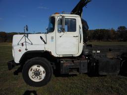 1996 Mack DM690S Tri-Axle Rolloff Truck