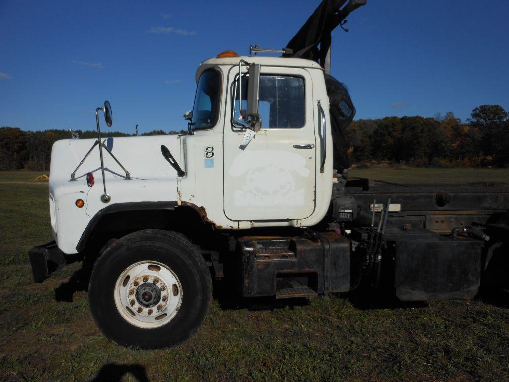 1996 Mack DM690S Tri-Axle Rolloff Truck