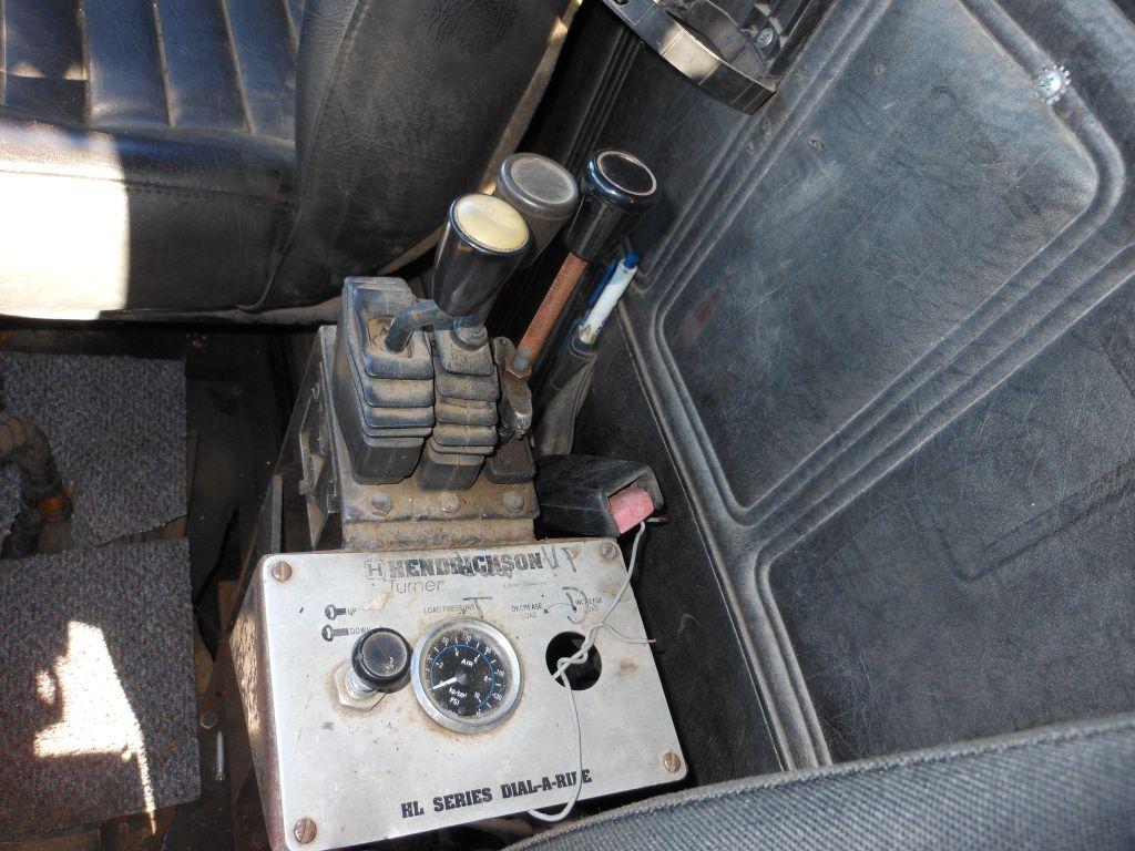 1996 Mack DM690S Tri-Axle Rolloff Truck