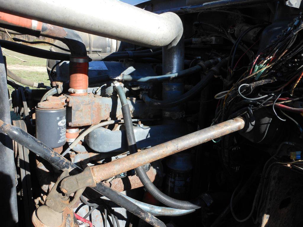 1996 Mack DM690S Tri-Axle Rolloff Truck
