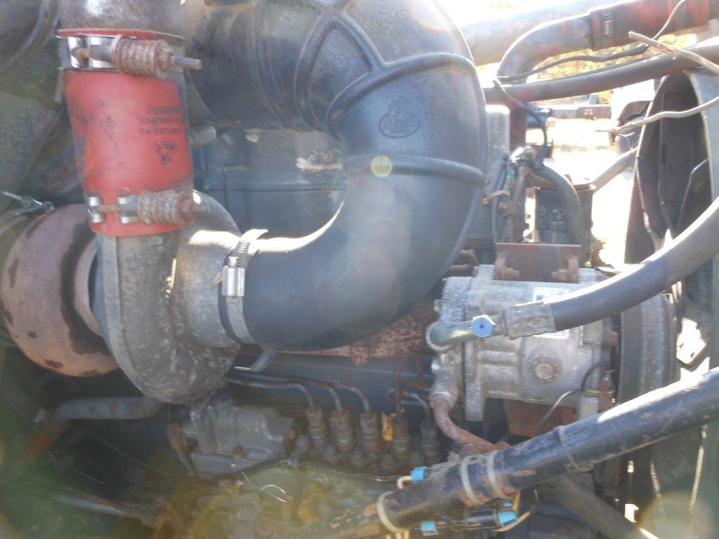1996 Mack DM690S Tri-Axle Rolloff Truck