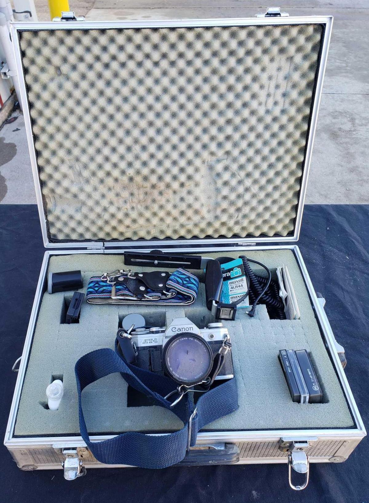 CANNON camera and traveling case