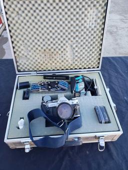 CANNON camera and traveling case