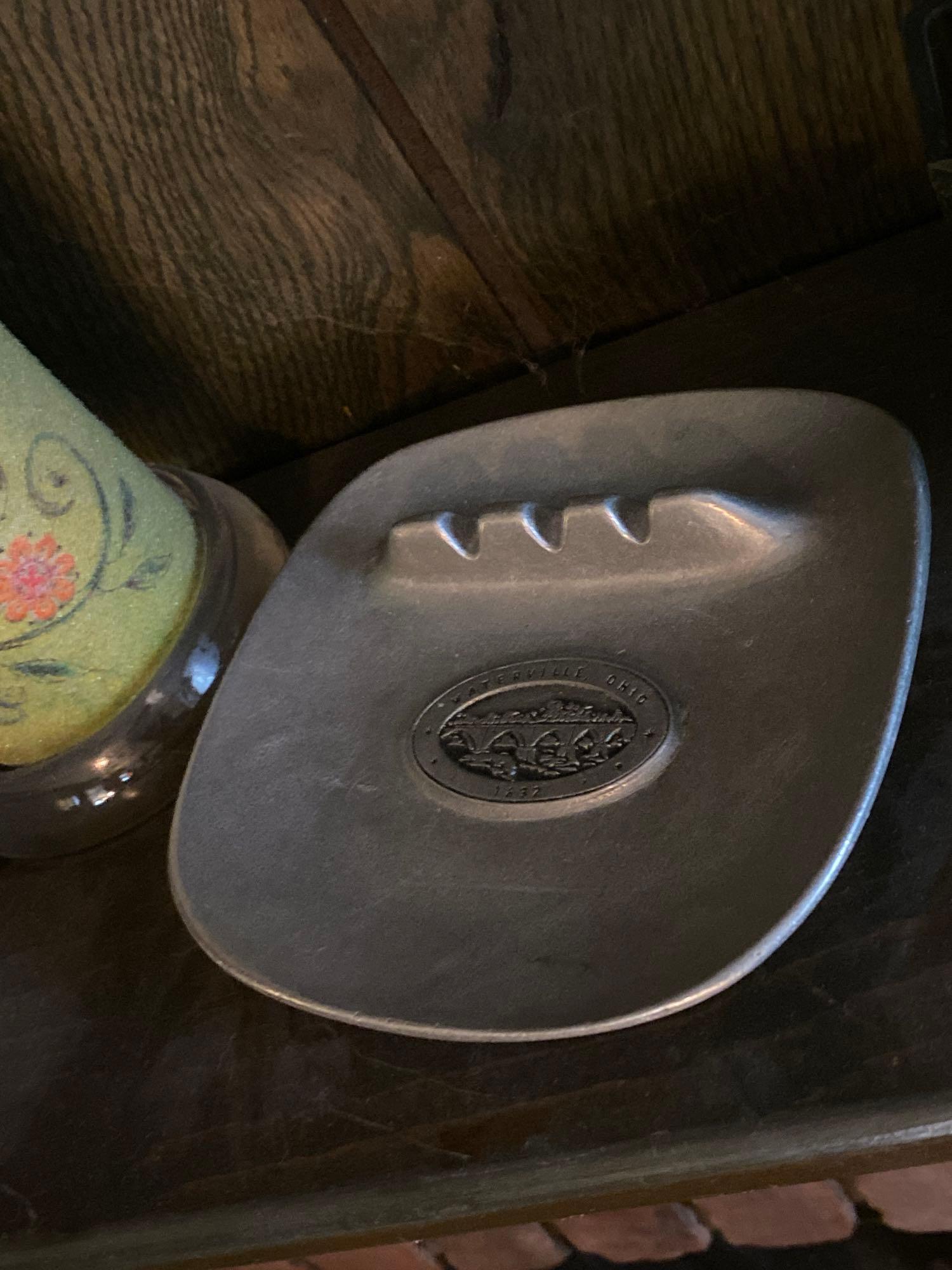 Assorted Collectibles On Mantle