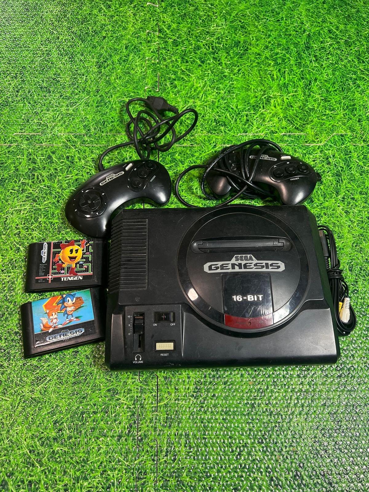 sega Genesis 16 bit with controllers and games