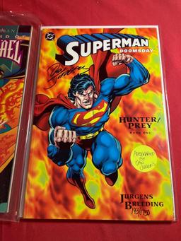 Signed Batman and Superman Comics