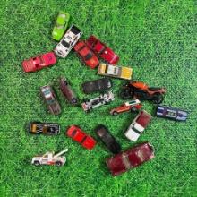 lot of vintage metal hot wheels and other toy cars