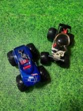 2 large hot wheels monster trucks