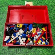 large red tackle box of vintage small piece legos 8-10 lbs