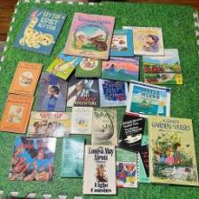 large lot of books mostly childrens