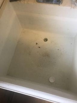 Slop sink on legs