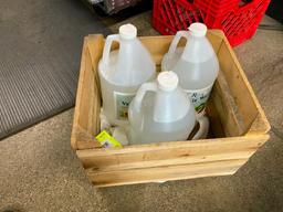 Wooden crate with 3 gallons of veggie wash