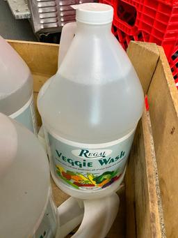 Wooden crate with 3 gallons of veggie wash