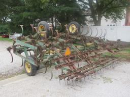 JD 1010 field cult w/ harrow 24'