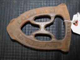 W.H. HOWELL CO., CAST IRON TRIVET