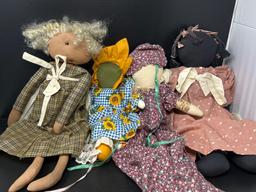 4 Various Cloth Dolls